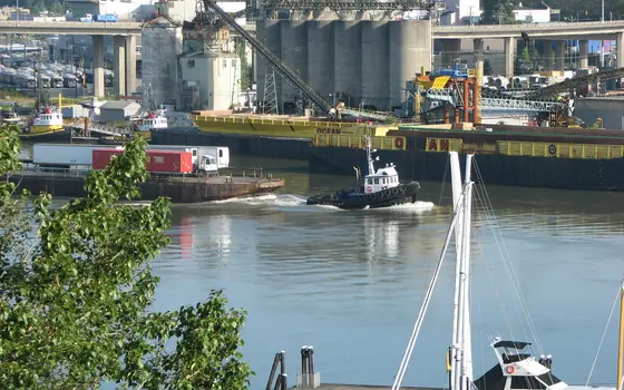 Tug and barge on the Fraser by River Rock